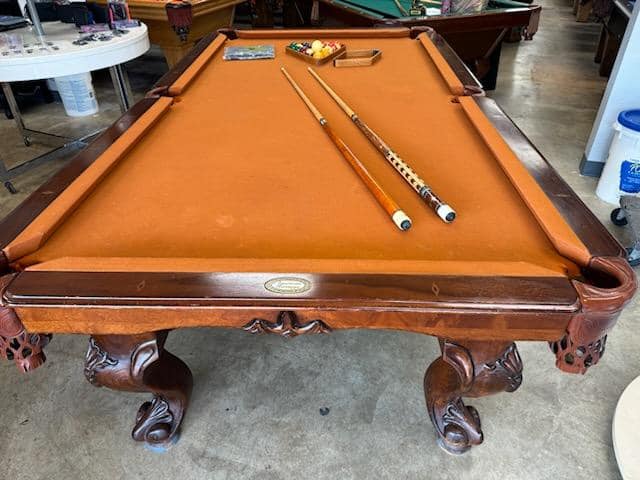 FOR SALE
 American Heritage.  8ft 3 piece slate pool table.  Leather drop pocket...