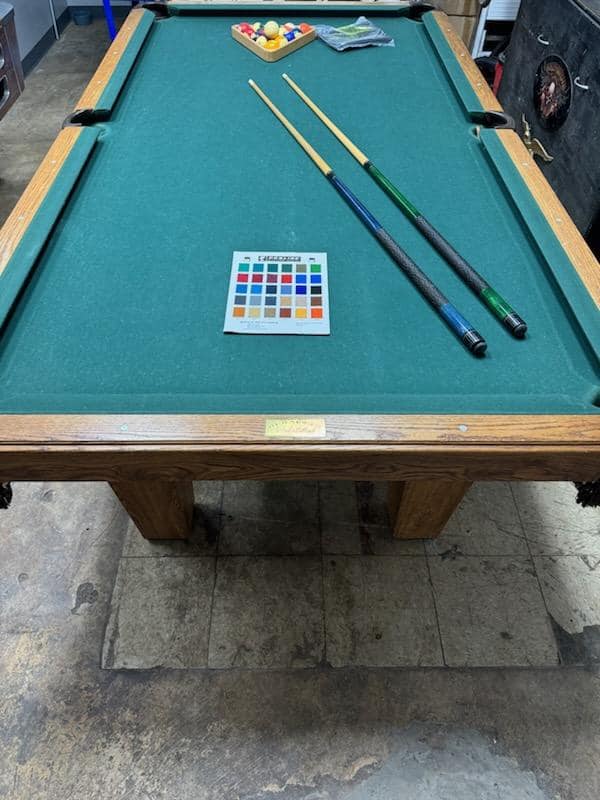 FOR SALE
 OLHAUSEN  8ft 3 piece slate. Leather drop pockets.  Comes with your ch...