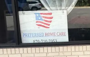 Preferred Home Care sign with American flag logo